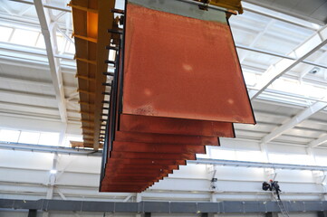 East Kazakhstan region, Kazakhstan - 12.02.2015 : Layers of cathode copper on a special lift for...