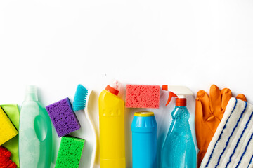 Cleaning concept. Set of cleaning supplies on white background with copy space, top view