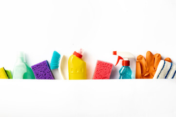 Set of various cleaning supplies on white background with copy space, top view - Powered by Adobe