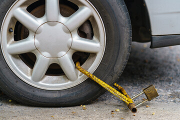 Locked wheel of a car parked in an improper place, because  illegal parking violation