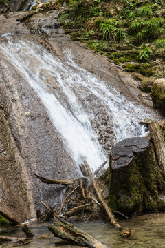 Waterfall Falling From Stones As Background