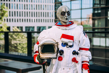 alien spaceman in a futuristic station © oneinchpunch