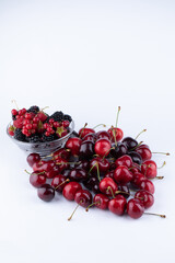 Cherry isolated. Cherry on white,red,black. Cherries. With clipping path.mixed fruit