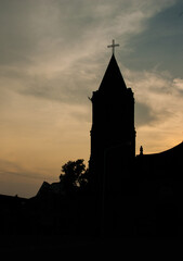 Silhouette of an old stone church