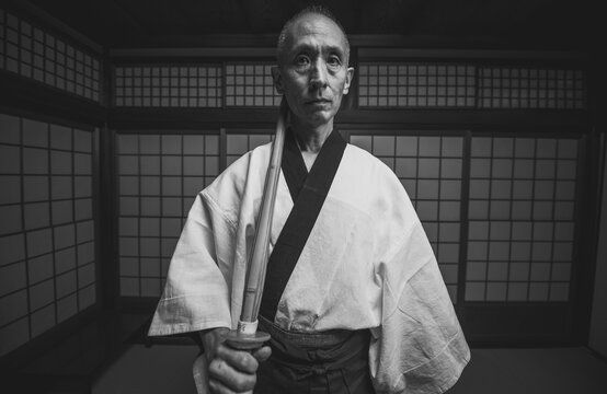 Senior Martial Art Master In His Dojo