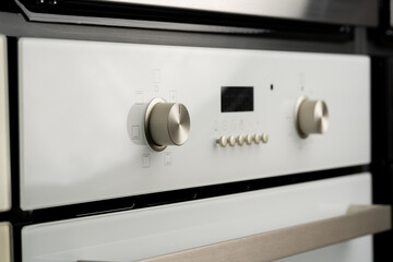 Modern oven mode control button close up