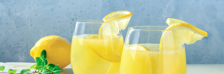 Lemonade panorama. Homemade fresh lemon drink panoramic banner. Healthy natural detox diet