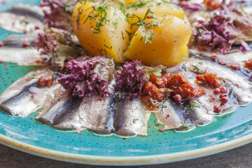 Baltic sprat, fillet. Traditional appetizer on the Baltic Sea. Service at a local restaurant