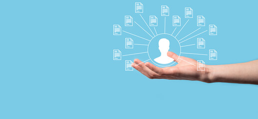 Document Management System DMS .Businessman hold user and document icon.Software for archiving, searching and managing corporate files and information.Internet Technology Concept.Digital security.