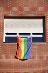 Flags of the LGBTIQ + Community on a window