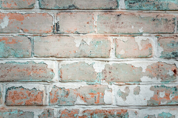 Fragment of an old brick wall.