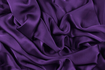 silk or satin luxury fabric texture can use as abstract background. Top view.