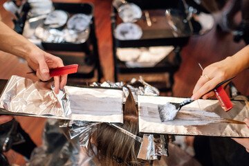 Airtouch technique. Hairdressers dyes hair