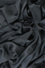 Abstract Satin Silky Cloth,Fabric Textile Drape with Crease Wavy Folds.with soft waves,waving in the wind.Texture of crumpled paper