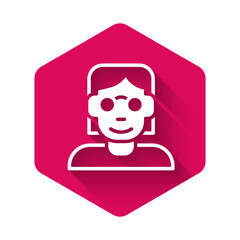 White Hacker or coder icon isolated with long shadow background. Programmer developer working on code, coding, testing, debugging, analysing. Pink hexagon button. Vector