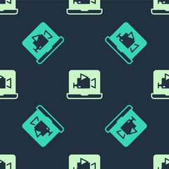 Green and beige Online play video icon isolated seamless pattern on blue background. Film strip with play sign. Vector