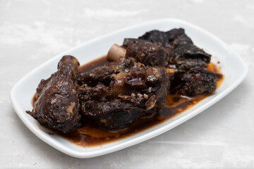 Old goat meat dish Chanfana, traditional portuguese, roasted in pans.