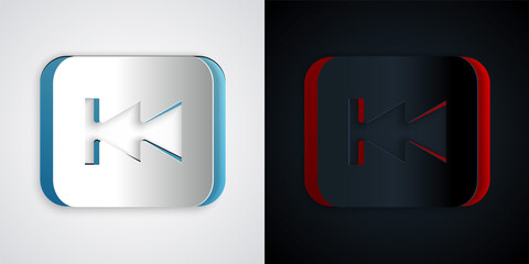 Paper cut Rewind button icon isolated on grey and black background. Paper art style. Vector