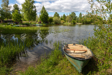 Obraz premium Valdai National Park. Boat on Lake Valdai. Novgorod region. Russia.