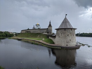 Fototapeta na wymiar old castle in the village of the country pskov russia ancient tower bricks wall