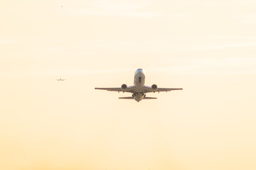 Fototapeta na wymiar airplane take-off departure flight runway sunrise dust