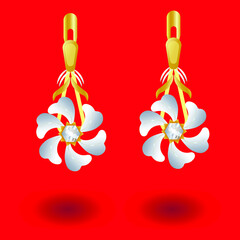 earrings in the form of flower petals in silver and gold on a red background 