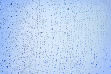 drops glass blue background abstract, transparent cold background water splashes