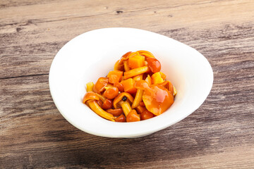 Marinated pickled honey mushrooms in the bowl