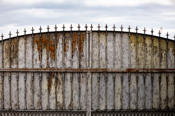 Old rusty gate in an abandoned house