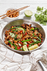 Thai cashew chicken stir fry in a pan