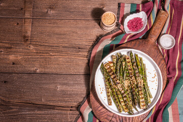 Ripe grilled asparagus. Rustic style arrangement, healthy food concept