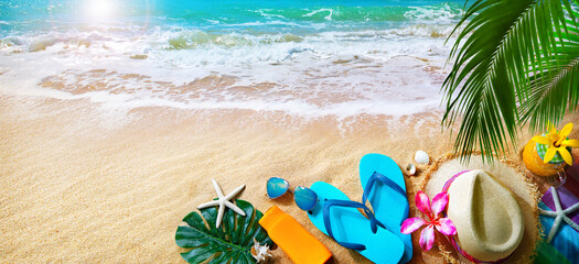 Ocean sand beach with sunbathing accessories