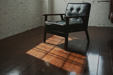 black chair sofa under the sunlight