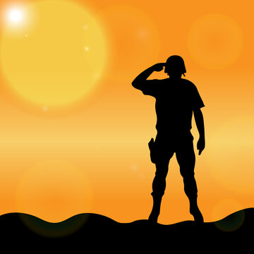 Silhouette of a solider saluting against the sunrise. Concept - protection, patriotism, honor.