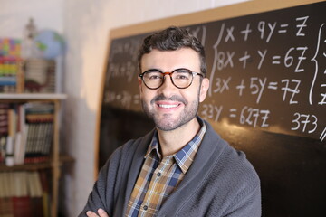 Cute math teacher in classroom 