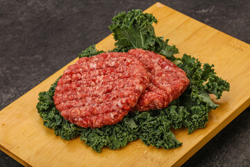Raw beef burger cutlet for cooking