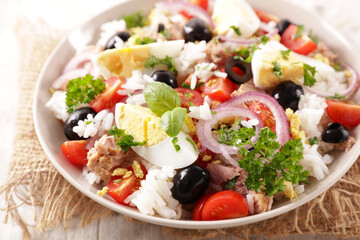 rice salad with egg,  tomato and onion