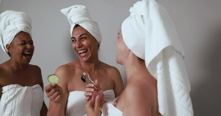 Multiracial women having fun together - Mature people with different skin color - Beauty day and skin care therapy concept - Powered by Adobe