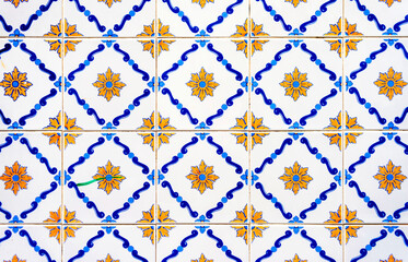 Old tiles wall on the street azulejos ceramic tile work. Porto, Portugal. - obrazy, fototapety, plakaty