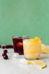 Lemon and cherry lemonade with ice