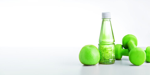 Healthy lifestyle concept, sport equipments and fresh foods on white background. Web Banner.