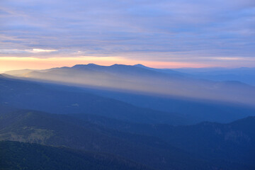 Morning sunbeam over Carpathian Mountains