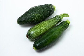 Zucchini on a white background. Vegetable for healthy nutrition. Healthly food