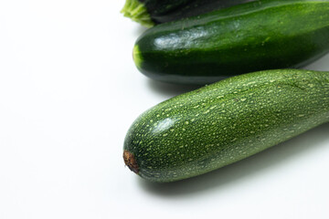 Zucchini on a white background. Vegetable for healthy nutrition. Healthly food