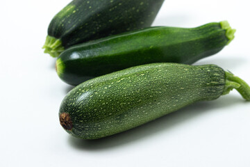 Zucchini on a white background. Vegetable for healthy nutrition. Healthly food