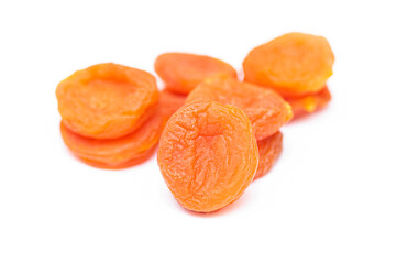 Naklejka na ściany i meble Dried apricots isolated on white, top view