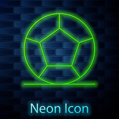 Glowing neon line Soccer football ball icon isolated on brick wall background. Sport equipment. Vector