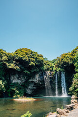 Fototapeta na wymiar Cheonjiyeon Falls in Jeju Island, Korea