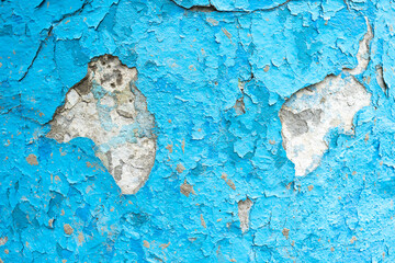 Close up of old stucco cracks on the wall Weathered paint cracks on plaster