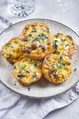Vegetarian egg muffins with mushroom, spinach and cheese for Breakfast